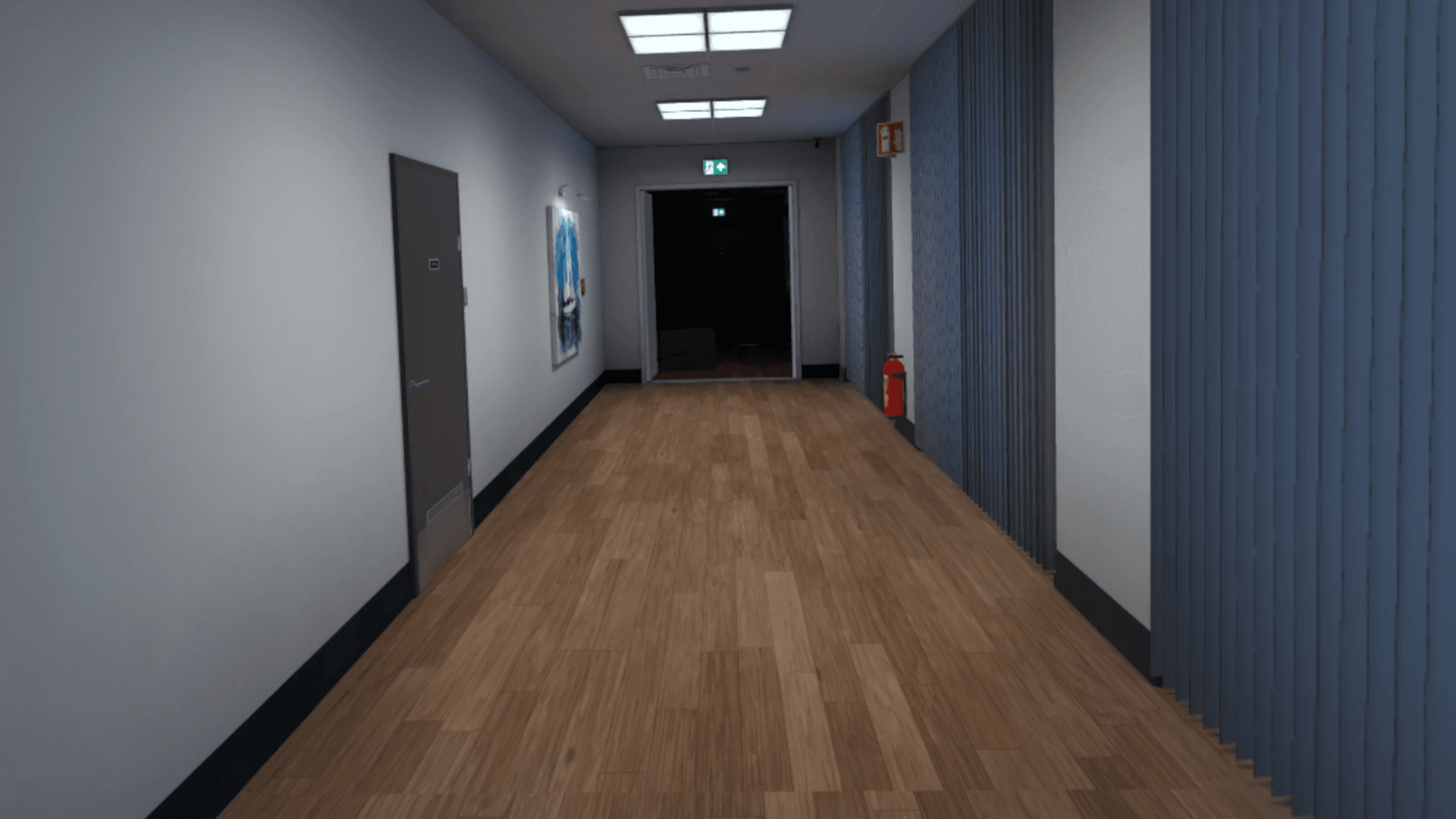 An empty office corridor at night with a fire extinguisher on the wall and a lit exit sign at the far end